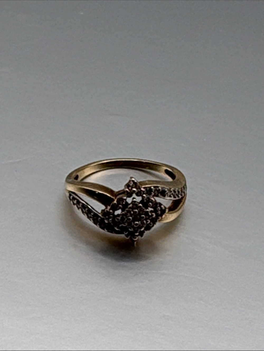 Mexico 14k gold ring with cluster diamonds.
Size 5.25